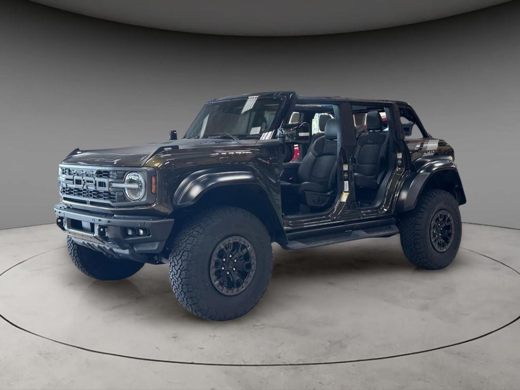 2025 Ford Bronco Raptor in Green Metallic — front three-quarter view